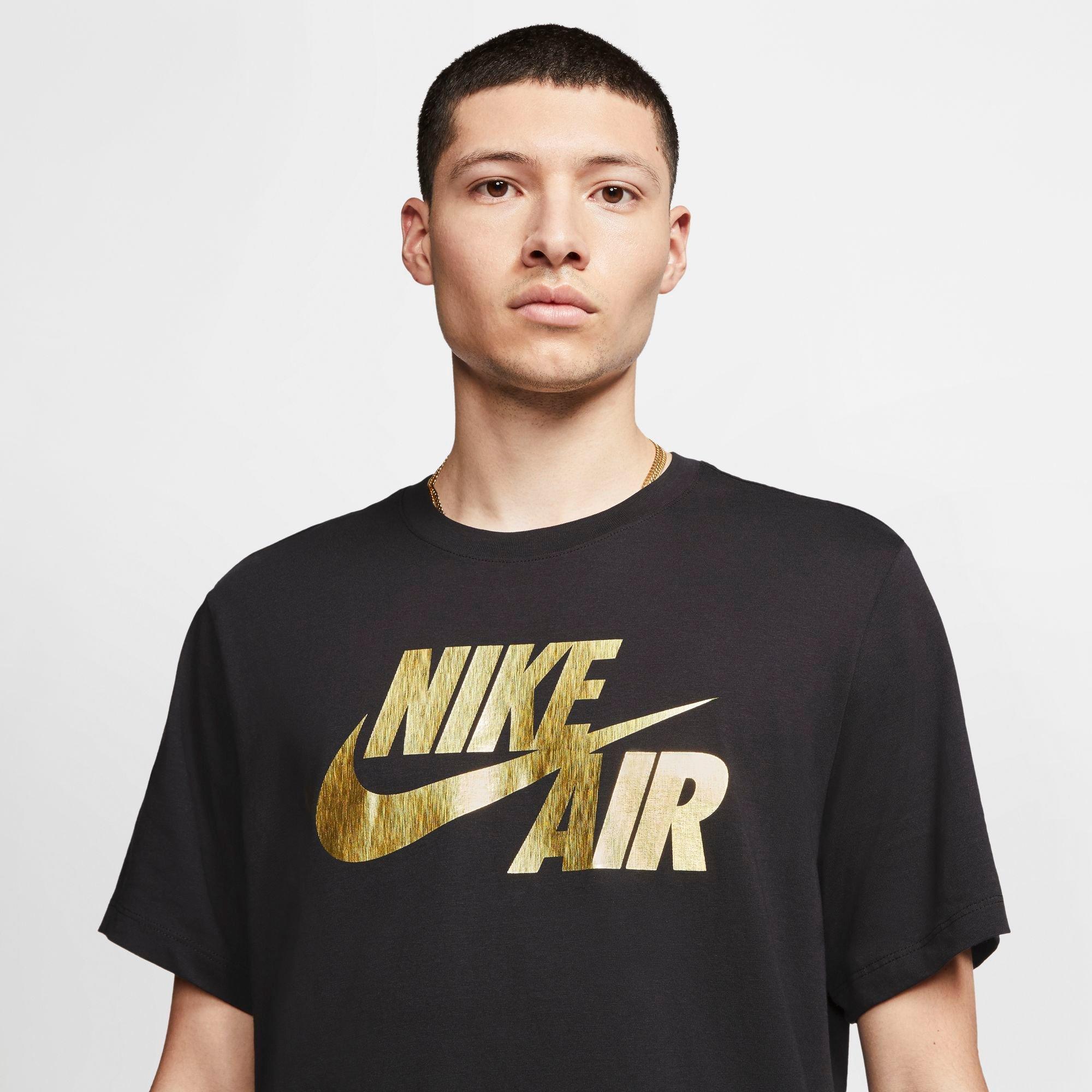 nike shirt black and gold